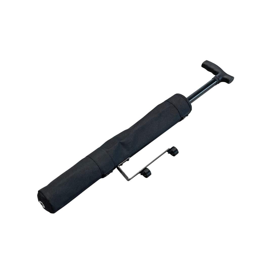 The Cane Holder For Whill Model F Powerchair is a black hand pump with a T-shaped handle, protective cover, fold-out footrest for stability, and serves as a walking stick accessory or cane holder. Displayed on a white background.